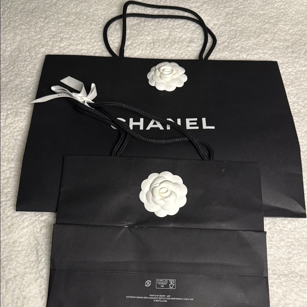 Chanel Black Bags with White Camellia Accent